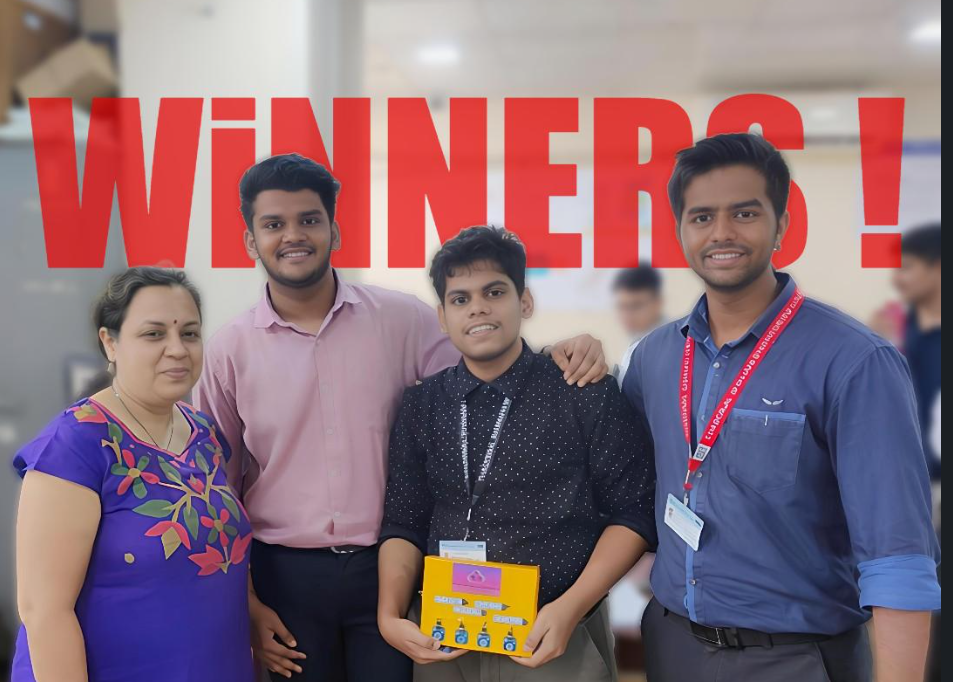 Celebrating a winning moment with fellow students and a mentor.